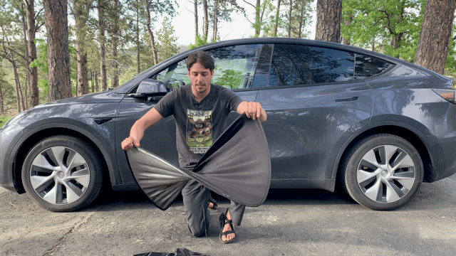 Showing how to fold Tesla roof sunshades in front of Model Y